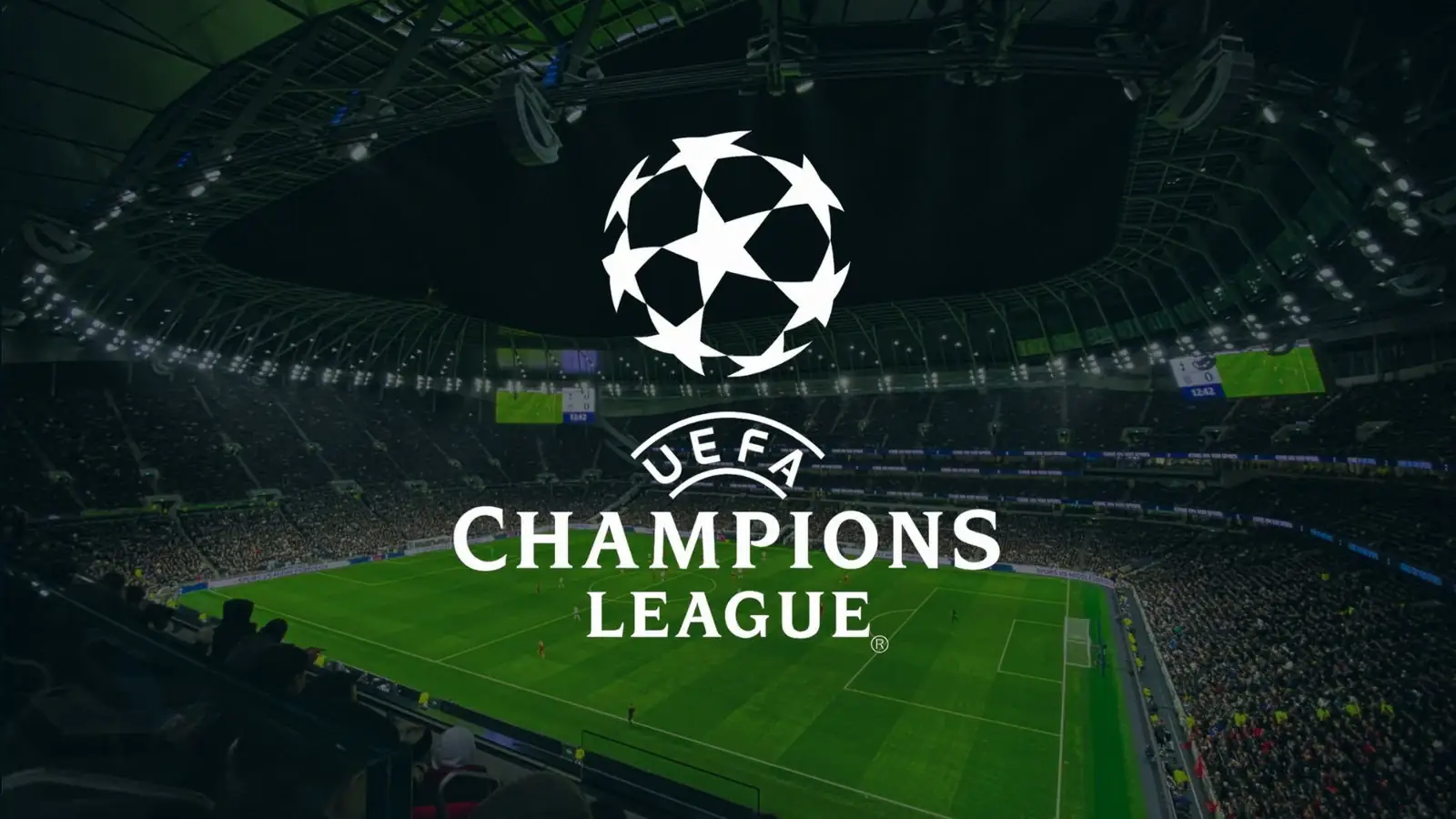Het logo van de UEFA Champions League voor een verlicht stadion met een vol publiek